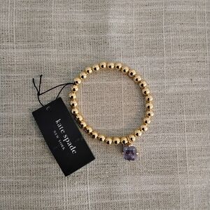 Kate Spade Gold Bracelet with Lavender Charm